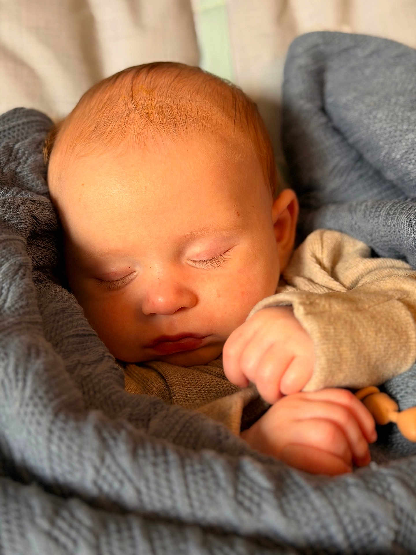 Noa joined the competition — help win amazing prizes! baby, sleeping, blanket, knitted, cozy, peaceful, face, hand, infant, closeup, soft, warm, cute, child, portrait, resting, skin, newborn, comfort, relaxation