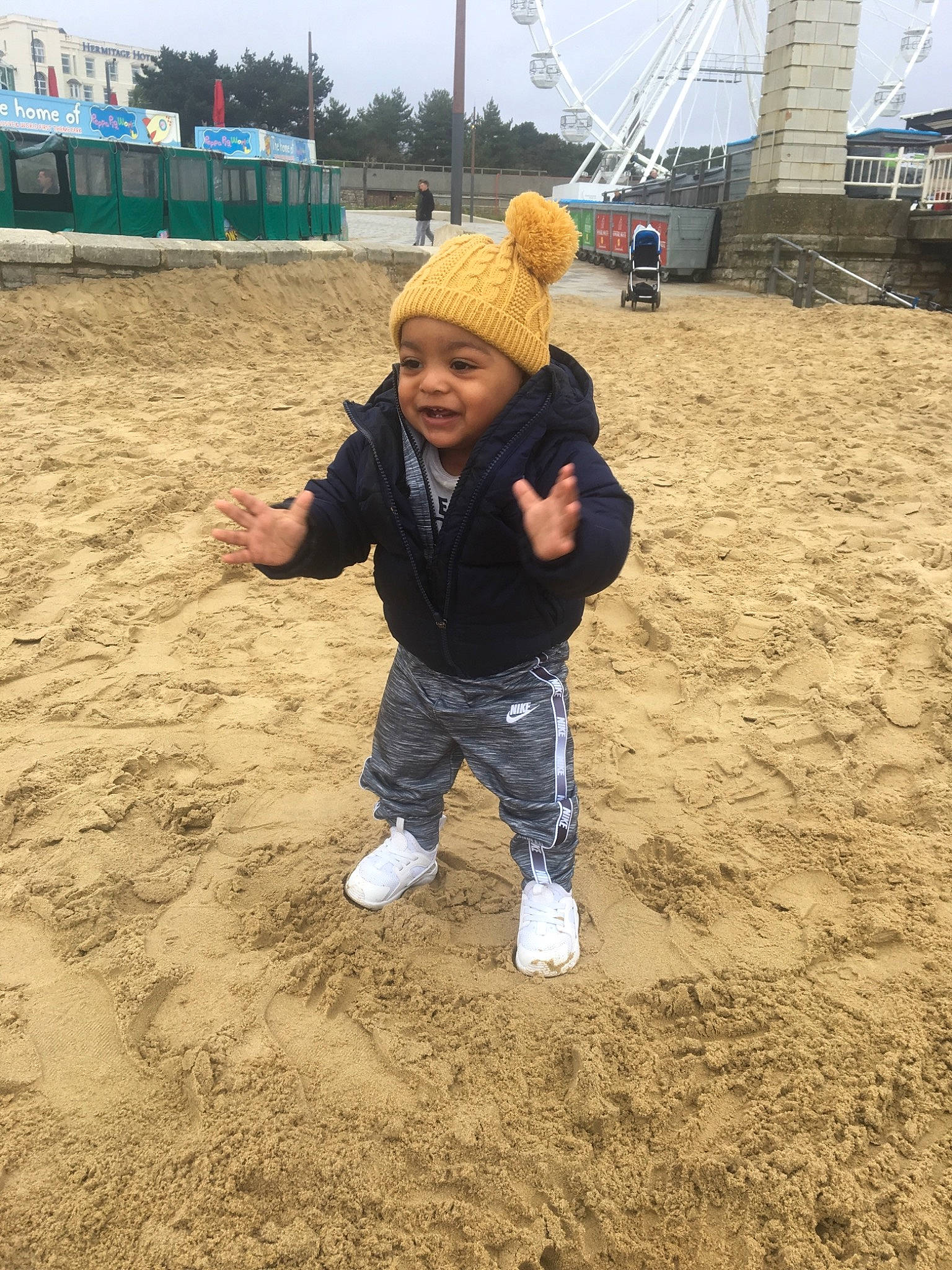 Koby is registered to the contest to win money with this photo: child, fun, headwear, person, play, sand, soil, toddler, vacation