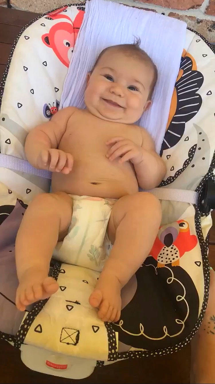 Davina is registered to the contest to win money with this photo: abdomen, arm, baby, cheek, chest, child, comfort, eyelash, finger, happy, human_body, joy, muscle, pattern, person, skin, smile, stomach, thigh, thumb