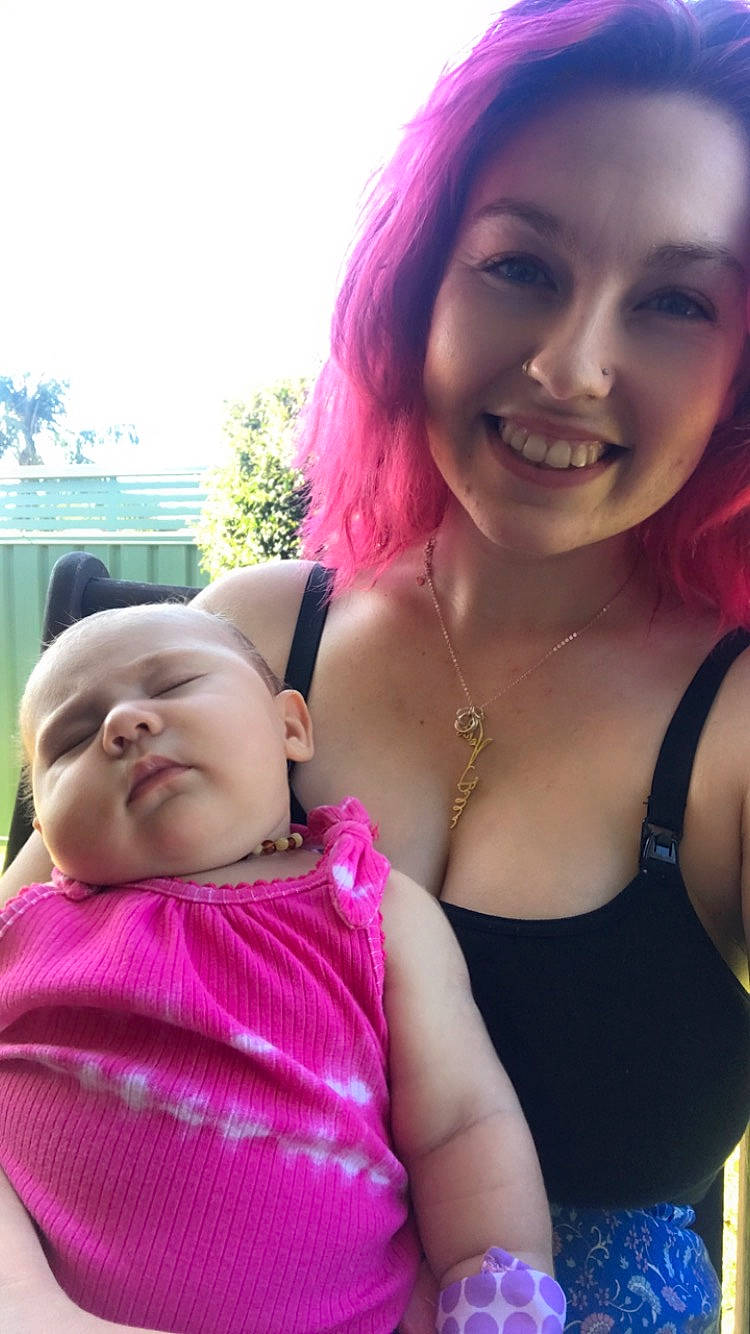 Davina is registered to the contest to win money with this photo: baby, bangs, black_hair, clothing, eye, face, grass, hairstyle, happy, human_body, joy, lip, magenta, mouth, muscle, person, pink, shoulder, skin, smile