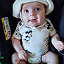 baby, bright_eyes, car_seat, child, clothing, cute, foot, hand, happy, hat, indoor, infant, mickey_mouse, onesie, person, playful, seatbelt, smiling, toddler, tongue_out