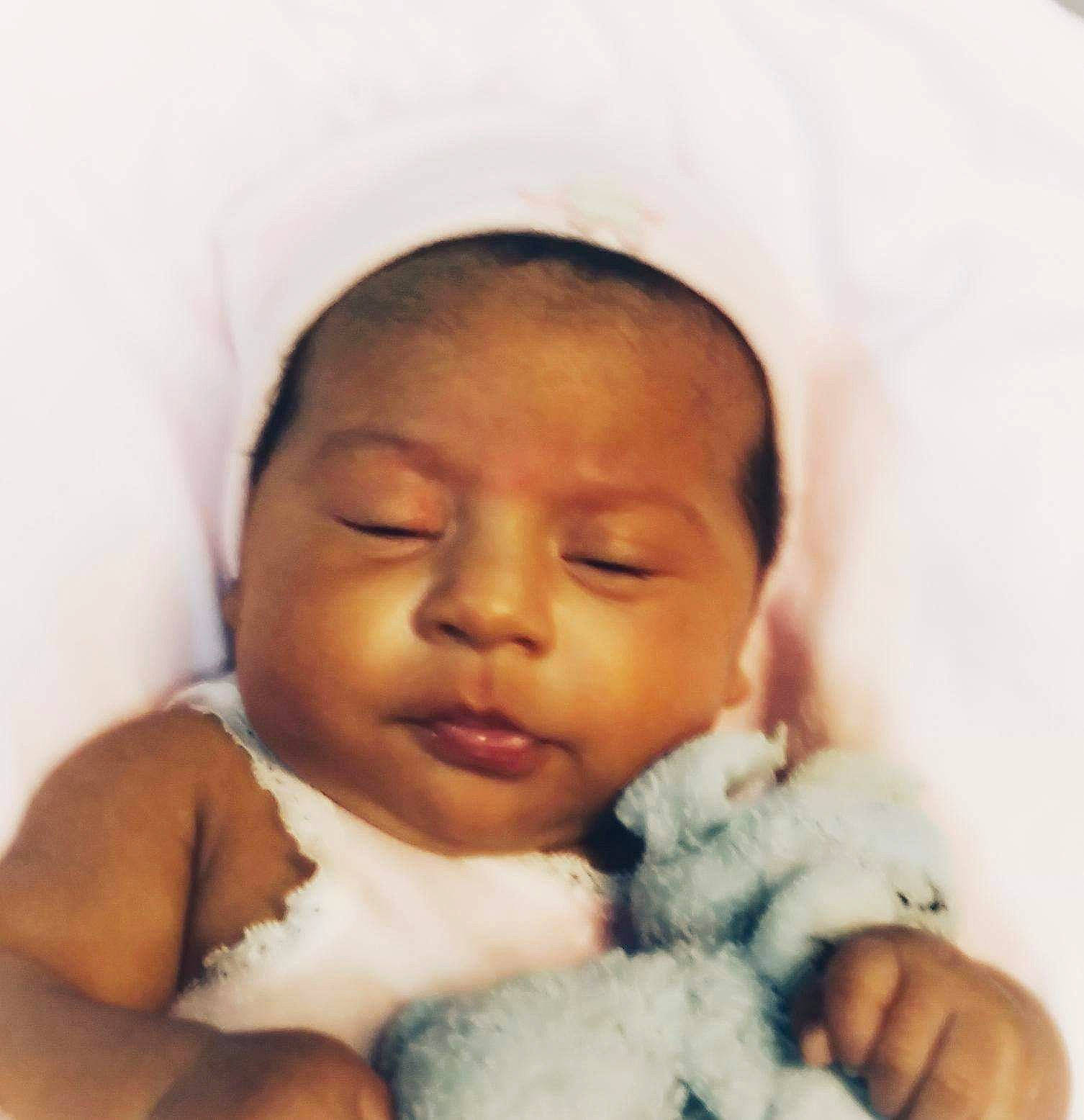 Brandi is registered to the contest to win money with this photo: baby, baby_sleeping, bedtime, birth, cheek, child, eye, face, hand, happy, head, human, linens, lip, nose, person, skin, sleep, smile, toddler