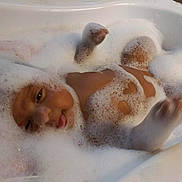 Brandi is registered to the contest to win money with this photo: bathing, bathtub, fawn