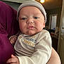 Cole is registered to the contest to win money with this photo: baby, beanie, bodypart, bonnet, cap, clothing, couch, cup, face, finger, furniture, hand, hat, head, indoors, lamp, newborn, person, photography, portrait