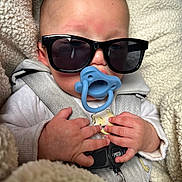 Cole joined the competition — help win amazing prizes! accessories, baby, bodypart, clothing, coat, face, finger, glasses, hand, head, jacket, jewelry, knitwear, newborn, person, photography, portrait, ring, sunglasses, sweater