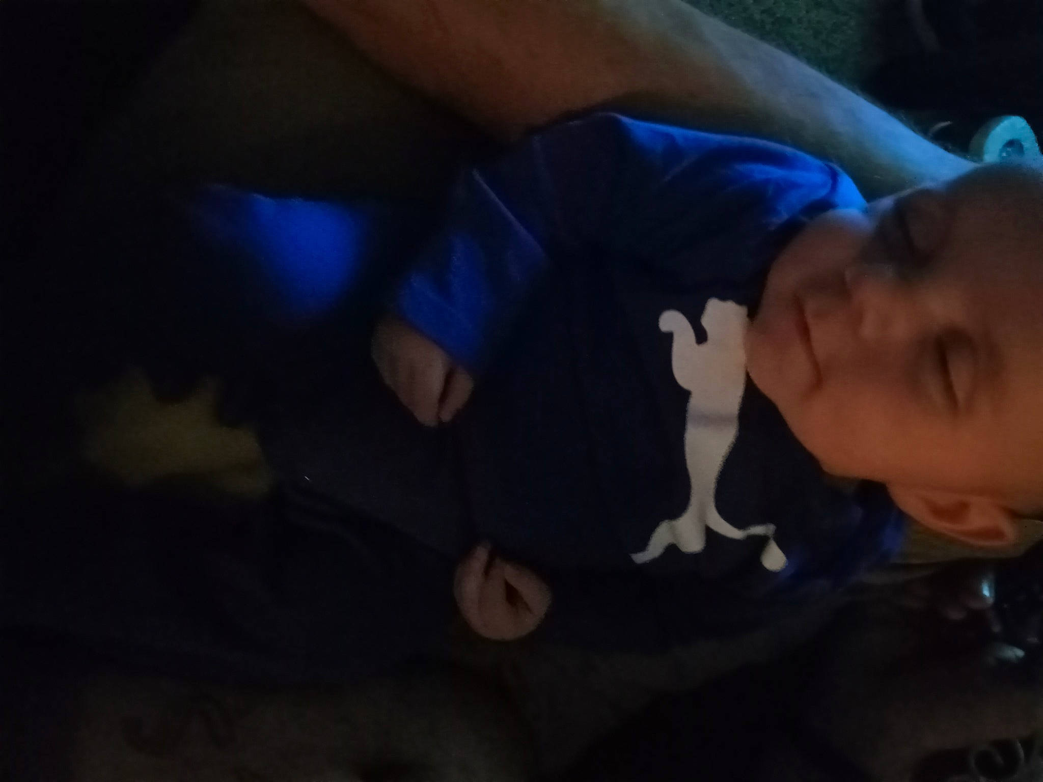 Hezekiah David is registered to the contest to win money with this photo: baby, baby_products, bedtime, child, cloud, comfort, darkness, elbow, electric_blue, flash_photography, flooring, fun, happy, human_leg, night, nose, person, room, sitting, t_shirt