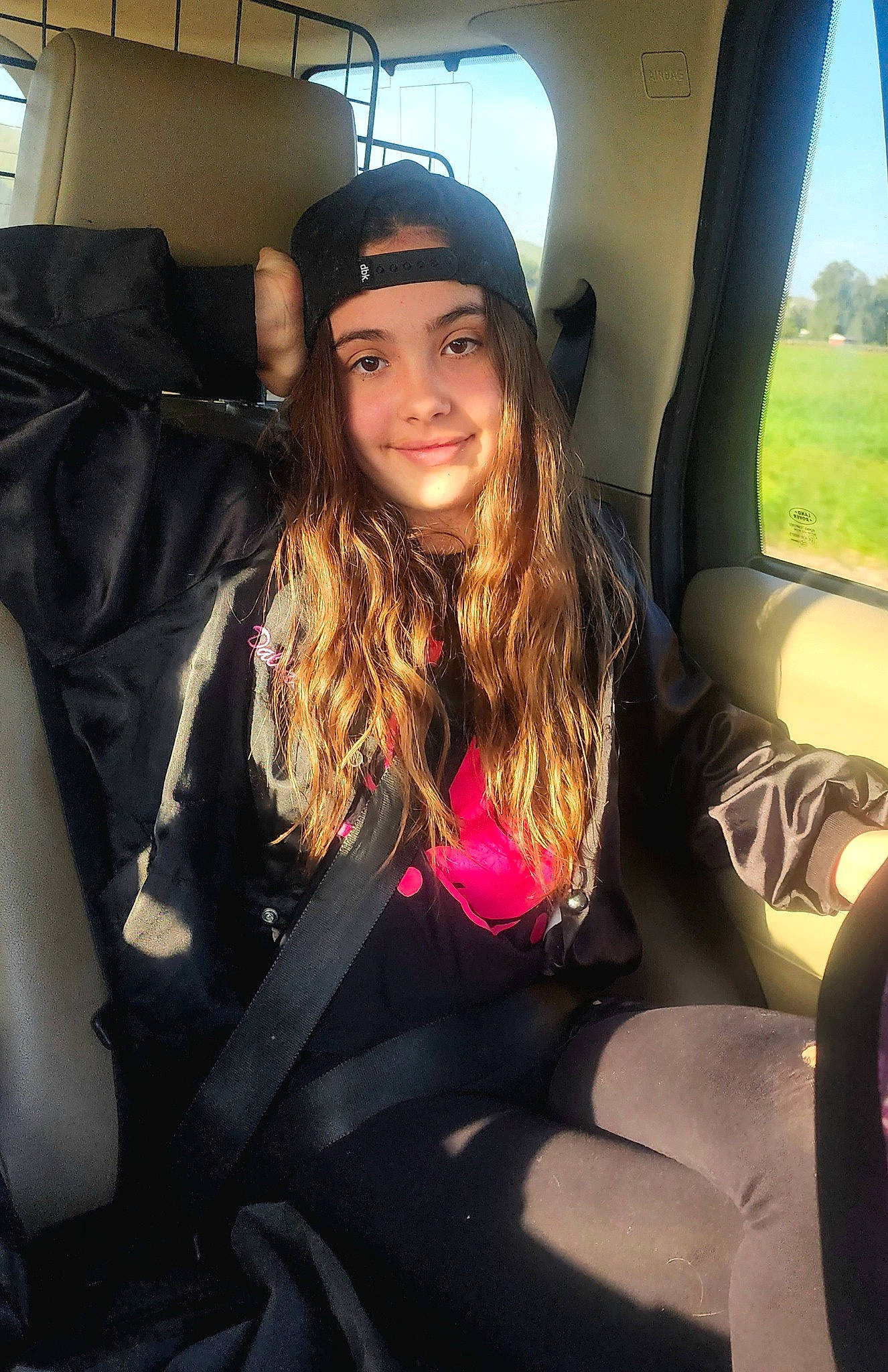 Capitola joined the competition — help win amazing prizes! auto_part, automotive_design, automotive_exterior, black_hair, cap, car_seat_cover, comfort, cool, eyewear, facial_expression, flash_photography, fun, head_restraint, headwear, human_leg, joy, long_hair, motor_vehicle, person, smile