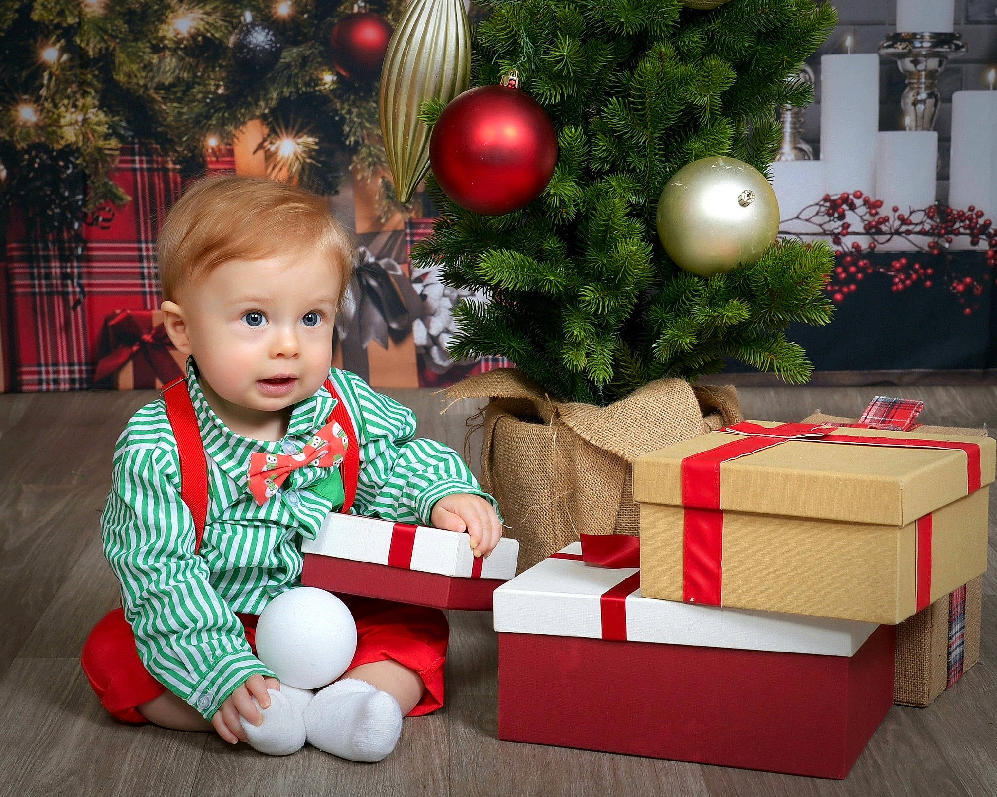 Augustino joined the competition — help win amazing prizes! baby, baby_toddler_clothing, child, christmas, christmas_decoration, christmas_eve, christmas_ornament, christmas_tree, event, fun, grass, happy, holiday, holiday_ornament, human_body, person, plant, red, sitting, toddler