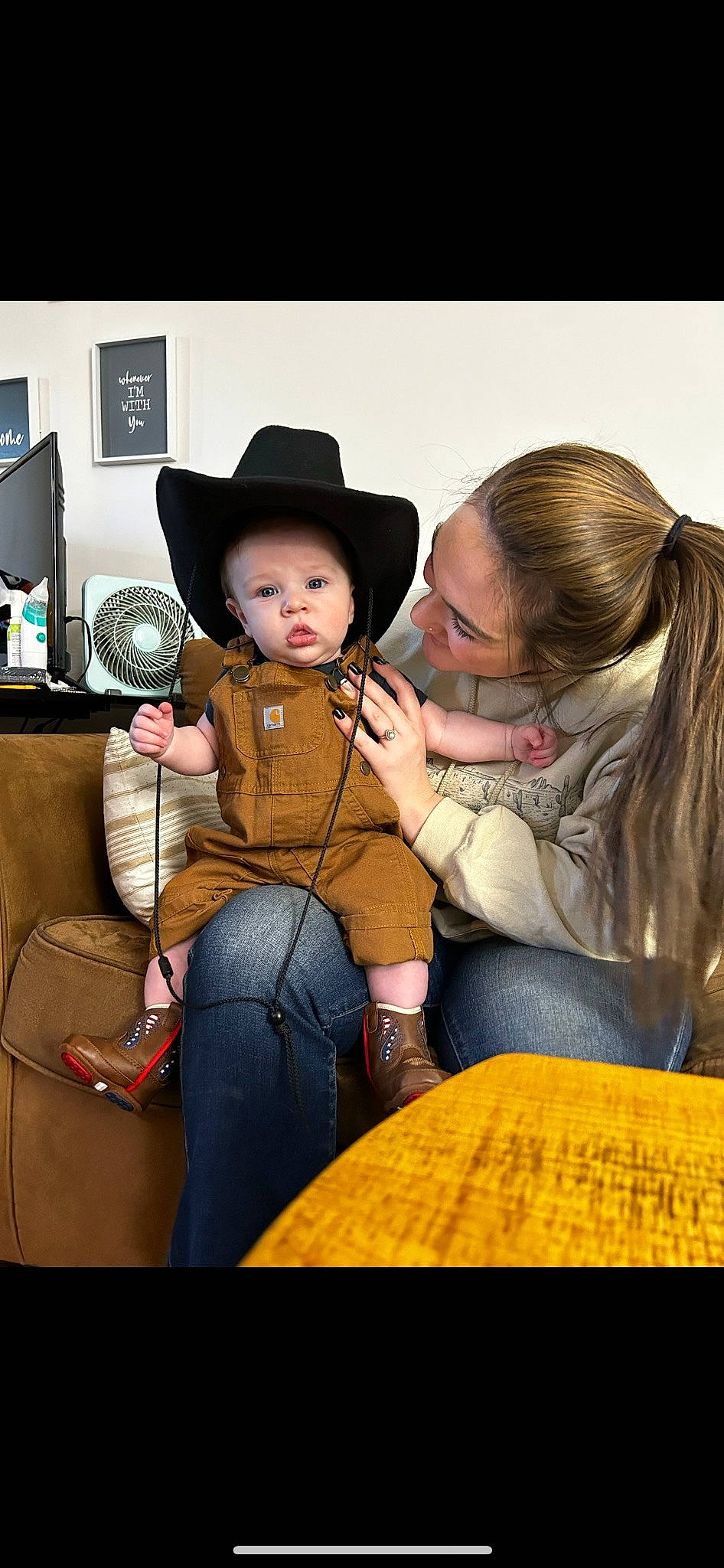 Asher joined the competition — help win amazing prizes! child, costume_hat, cowboy_hat, event, eyewear, fashion_accessory, fedora, fun, hat, jeans, jewellery, lamp, lampshade, luxury_vehicle, person, room, sitting, sun_hat, toddler