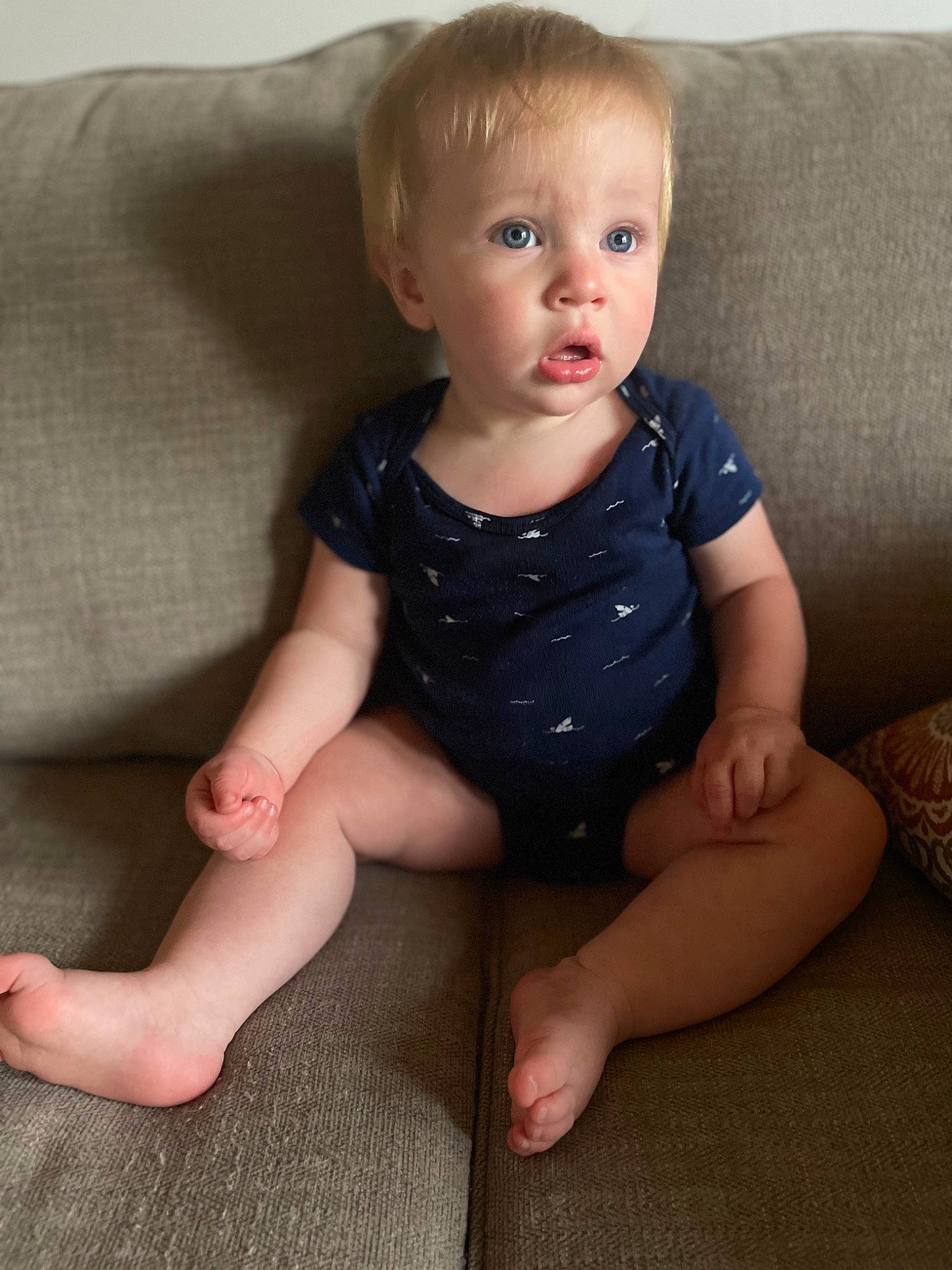Asher joined the competition — help win amazing prizes! baby, baby_toddler_clothing, cheek, comfort, couch, eye, face, finger, flooring, head, human_body, human_leg, iris, joint, knee, leg, neck, person, skin, sleeve
