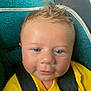 baby, infant, child, blue_eyes, yellow_shirt, car_seat, seat_belt, spiky_hair, close_up, portrait, indoor, child_seat, smile, face, person, cute, young_child, baby_clothing, safety, seat