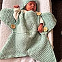Adam Angelov a rejoint le concours — aidez-le/la à gagner de superbes lots ! newborn, baby, sleeping, crochet, blanket, wooden_buttons, towel, white, mint_green, hand, cozy, soft, infant, peaceful, cute, lying_down, indoors, portrait, resting, wrapped