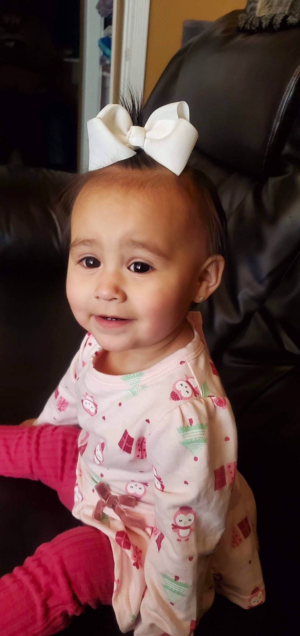 Jada joined the competition — help win amazing prizes! baby, baby_toddler_clothing, cheek, child, costume_accessory, couch, embellishment, eye, hair_accessory, headband, headpiece, iris, joy, lip, living_room, mouth, nose, person, pink, ribbon