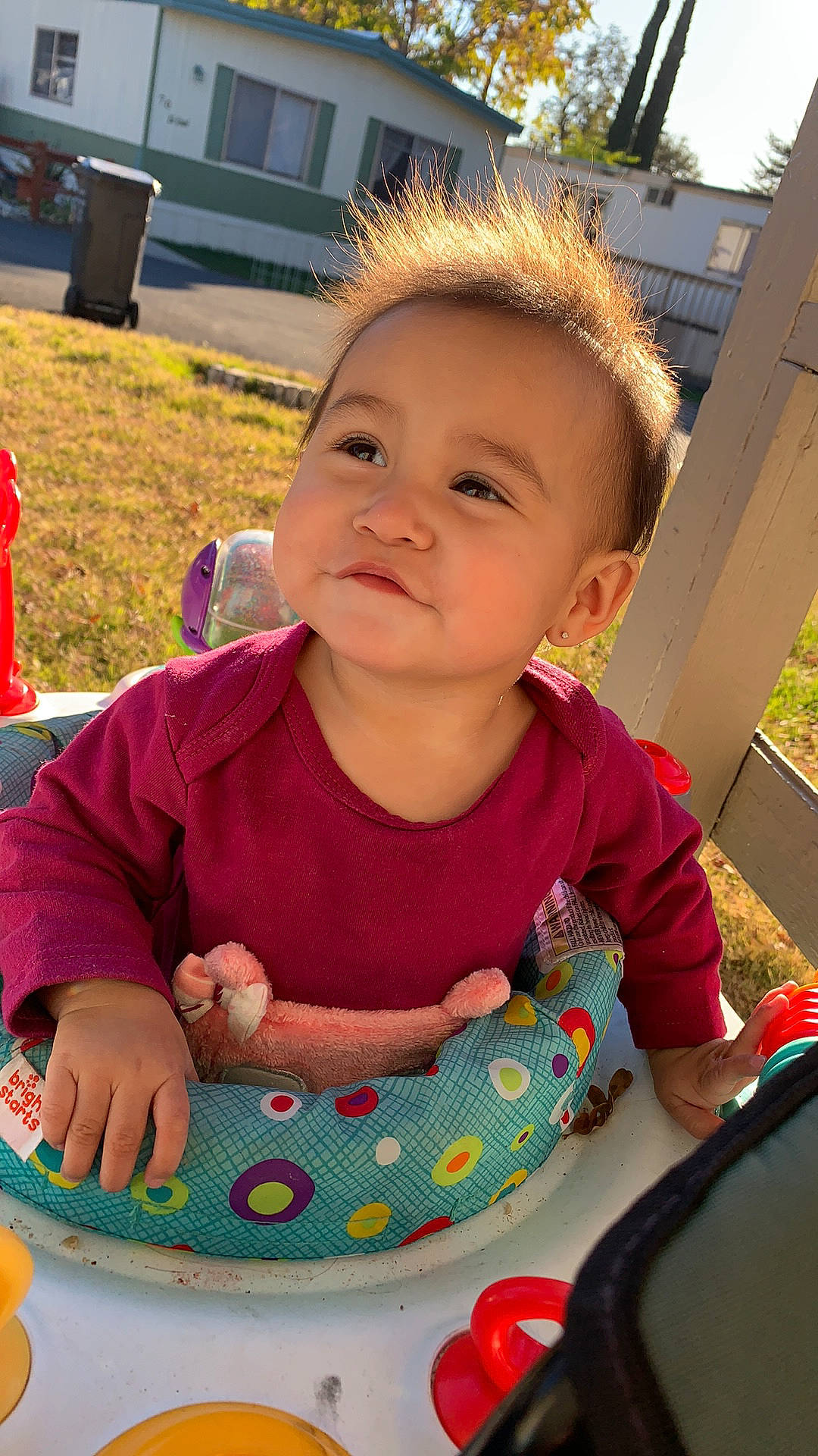 Jada joined the competition — help win amazing prizes! baby, baby_toddler_clothing, bib, child, input_device, mouse, person, polka_dot, toddler, yard