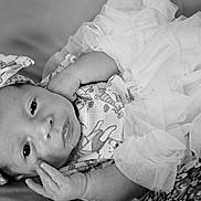 Bailey joined the competition — help win amazing prizes! baby, infant, headwrap, tutu, clothing, portrait, black_and_white, cute, face, looking, hand, soft, fabric, pattern, laying, newborn, person, child, expression, closeup