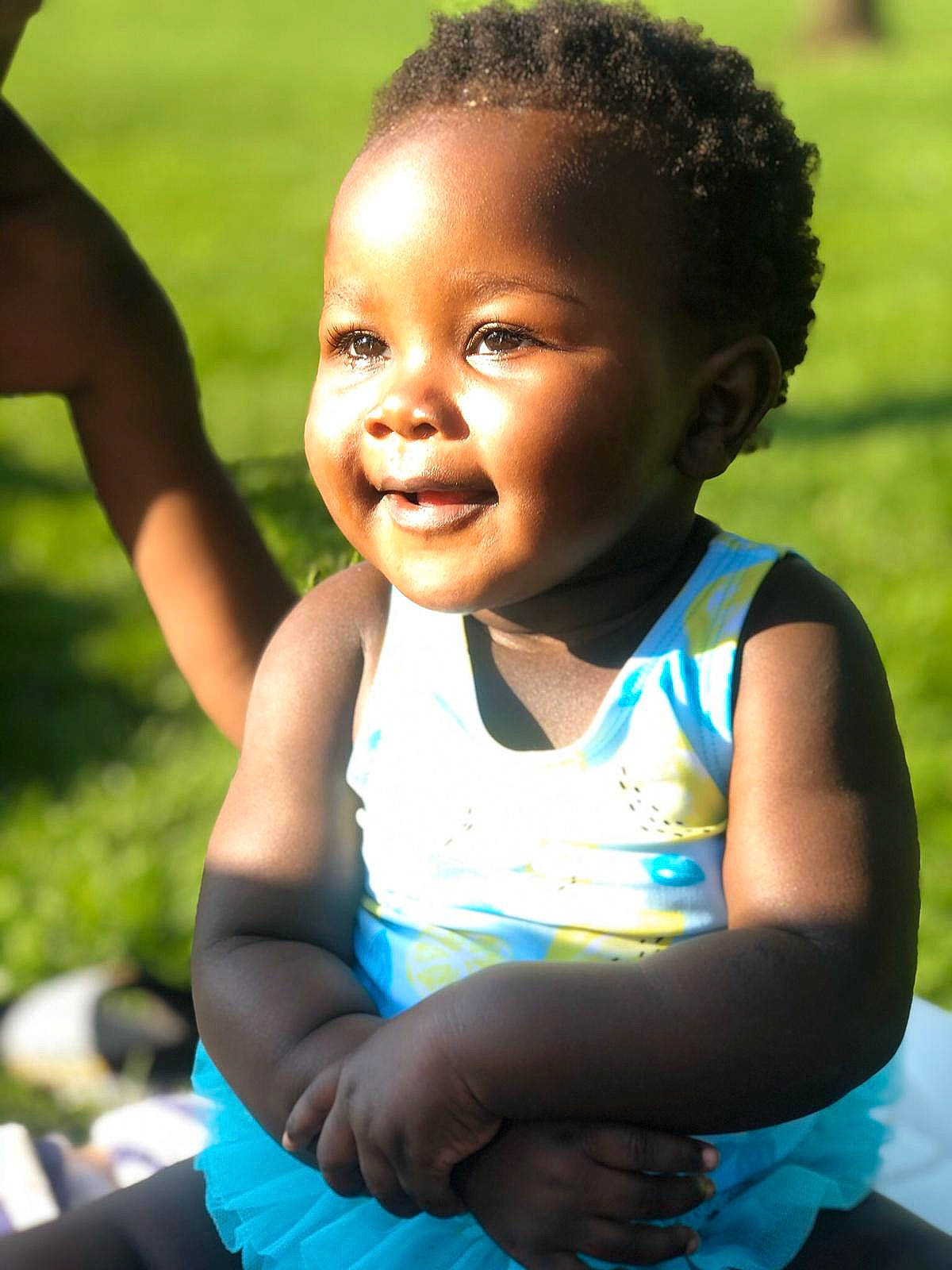 Charity is registered to the contest to win money with this photo: adaptation, child, face, facial_expression, fun, grass, happy, people, person, photography, skin, smile, summer, toddler, vacation