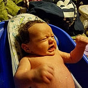 Shelby joined the competition — help win amazing prizes! baby, bathtub, bath, infant, water, wet, clothing, toddler, face, expression, room, furniture, blanket, person, hair, skin, indoors, child, bathroom, upset