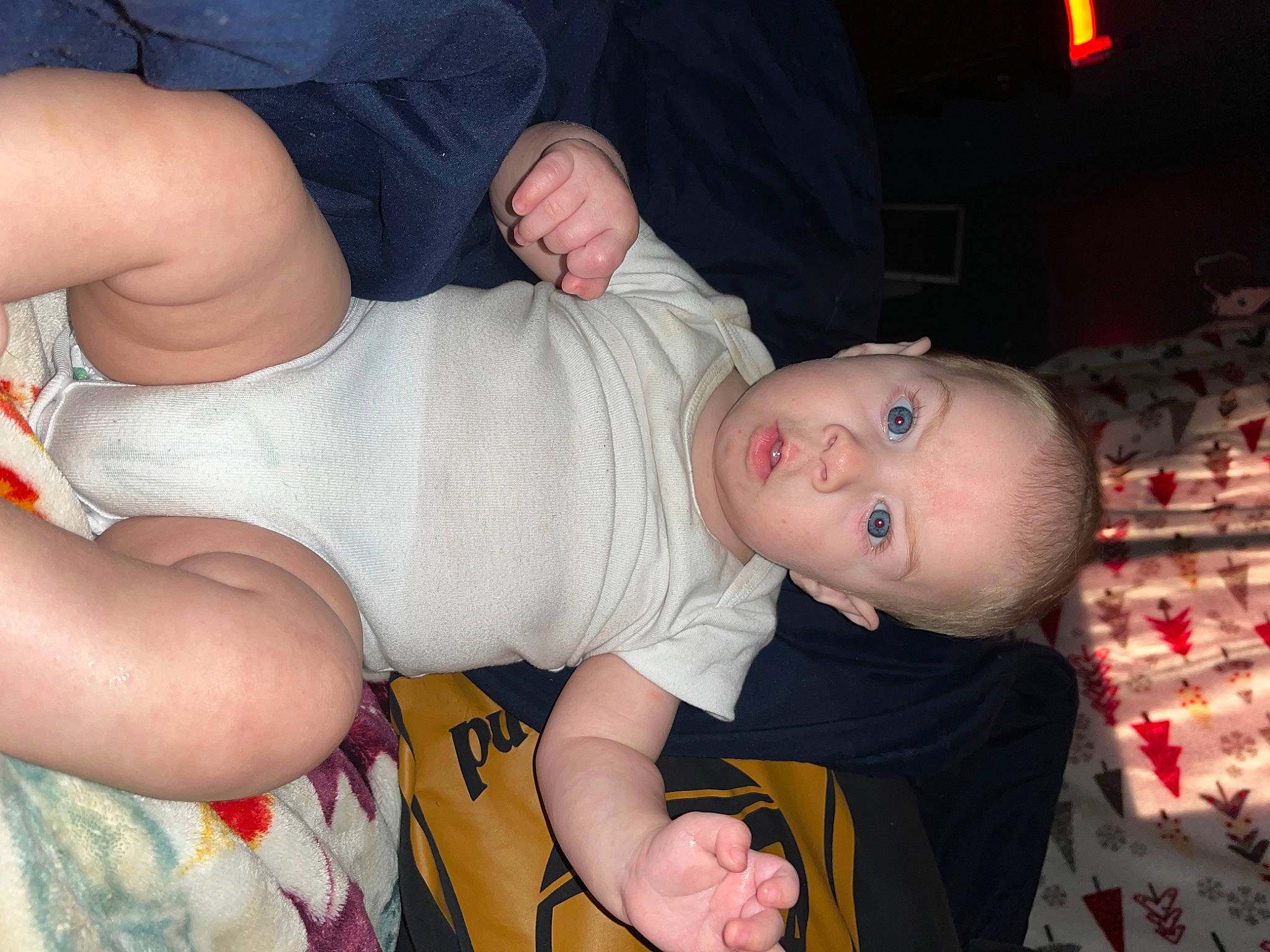 Brodie is registered to the contest to win money with this photo: baby, baby_products, baby_toddler_clothing, cheek, child, comfort, elbow, event, finger, fun, gesture, hand, human_leg, leg, mouth, nail, person, skin, smile, surprise