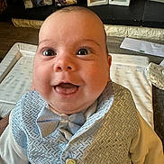 Oscar joined the competition — help win amazing prizes! apparel, baby, bow_tie, cheerful, child, closeup, clothing, cute, expression, face, happy, indoors, infant, jacket, newborn, person, photography, portrait, smiling, vest