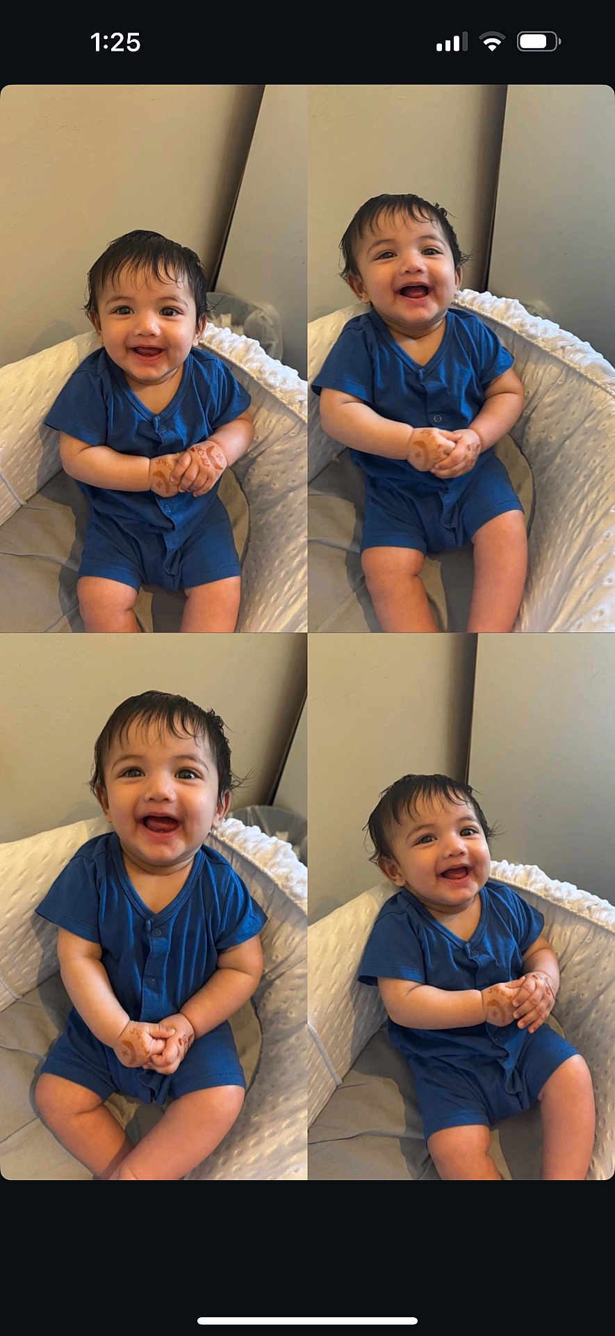 Ruhaan joined the competition — help win amazing prizes! baby, child, smiling, blue_clothing, indoor, cushioned_seat, hands_clasped, cute, happy, infant, portrait, sitting, young_child, baby_girl, baby_boy, romper, cute_expression, face, person, cozy