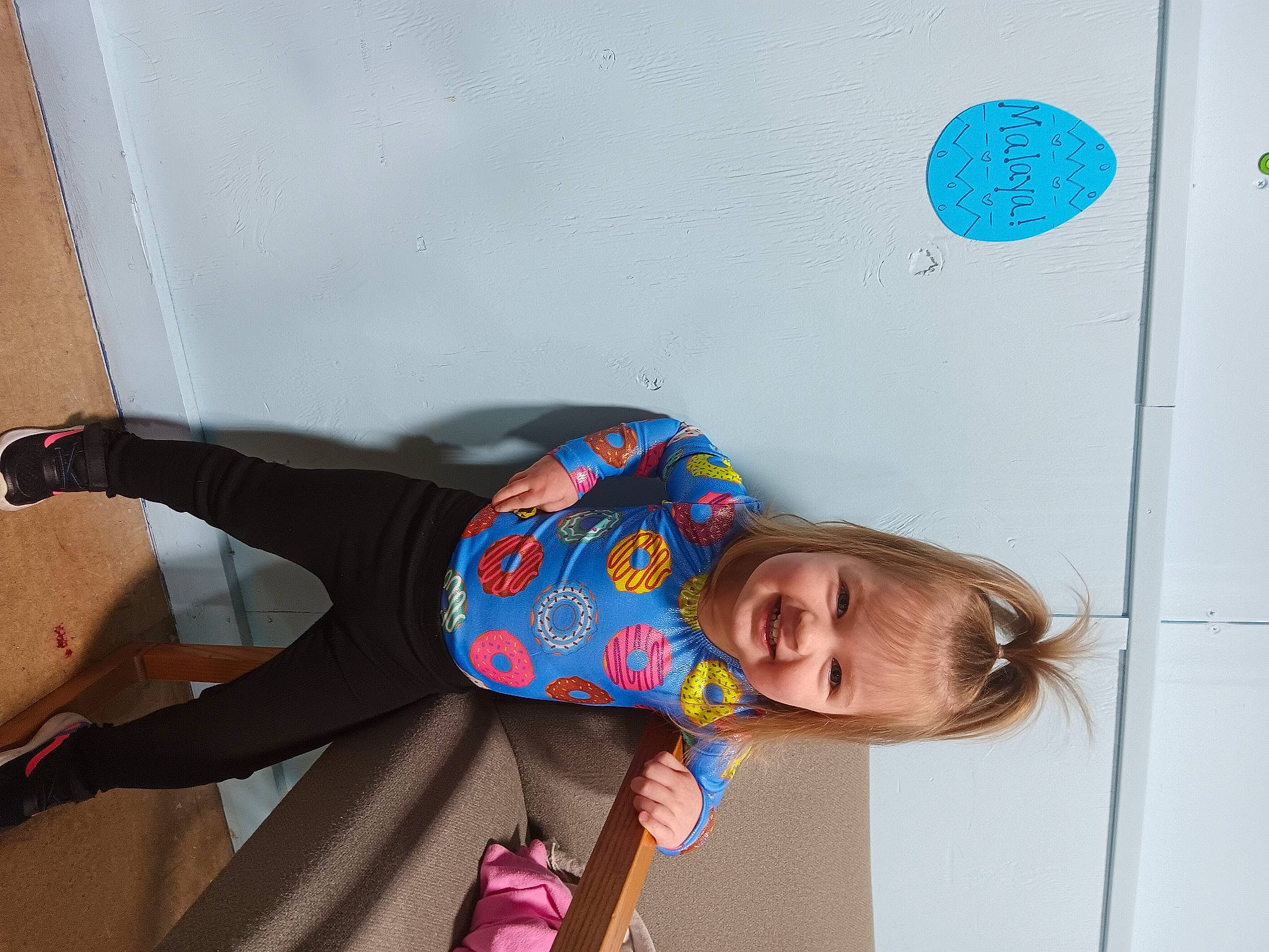 Malaya is registered to the contest to win money with this photo: child, electric_blue, fun, happy, joy, knee, leisure, magenta, pattern, person, room, sitting, smile, standing, sunglasses, textile, thigh, toddler, vacation, waist