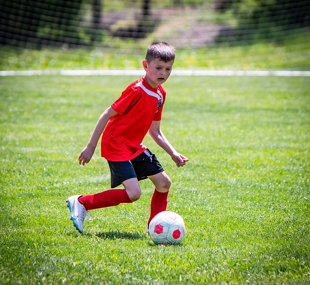 Gunner joined the competition — help win amazing prizes! ball, ball_game, competition_event, football, football_player, fun, grass, leisure, people_in_nature, person, player, playing_sports, shorts, soccer, soccer_ball, soccer_kick, soccer_player, sports, sports_equipment, team_sport