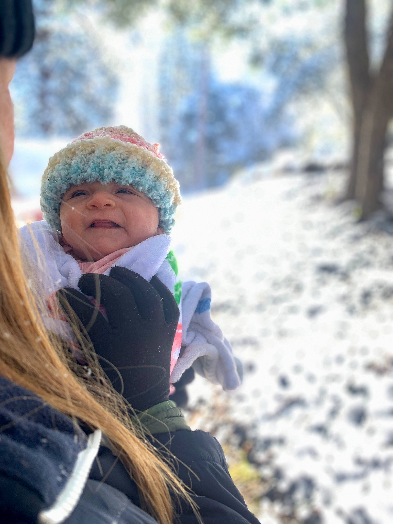 Ella-rose is registered to the contest to win money with this photo: adventure, child, eyewear, fashion_accessory, freezing, fun, fur, grass, happy, headwear, landscape, leisure, mountainous_landforms, people_in_nature, person, recreation, scarf, sitting, snow, tree