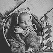 Alessyo a rejoint le concours — aidez-le/la à gagner de superbes lots ! newborn, baby, sleeping, basket, knitted_clothing, bear_ears, black_and_white, portrait, cozy, infant, hand, texture, rug, floor, peaceful, wrapped, cute, closeup, studio, soft_lighting