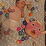Emersyn joined the competition — help win amazing prizes! baby, infant, blanket, crochet, easter_eggs, toy, plush, headband, bow, onesie, floor, carpet, child, cute, indoor, laying_down, colorful, soft_toy, playtime, decor