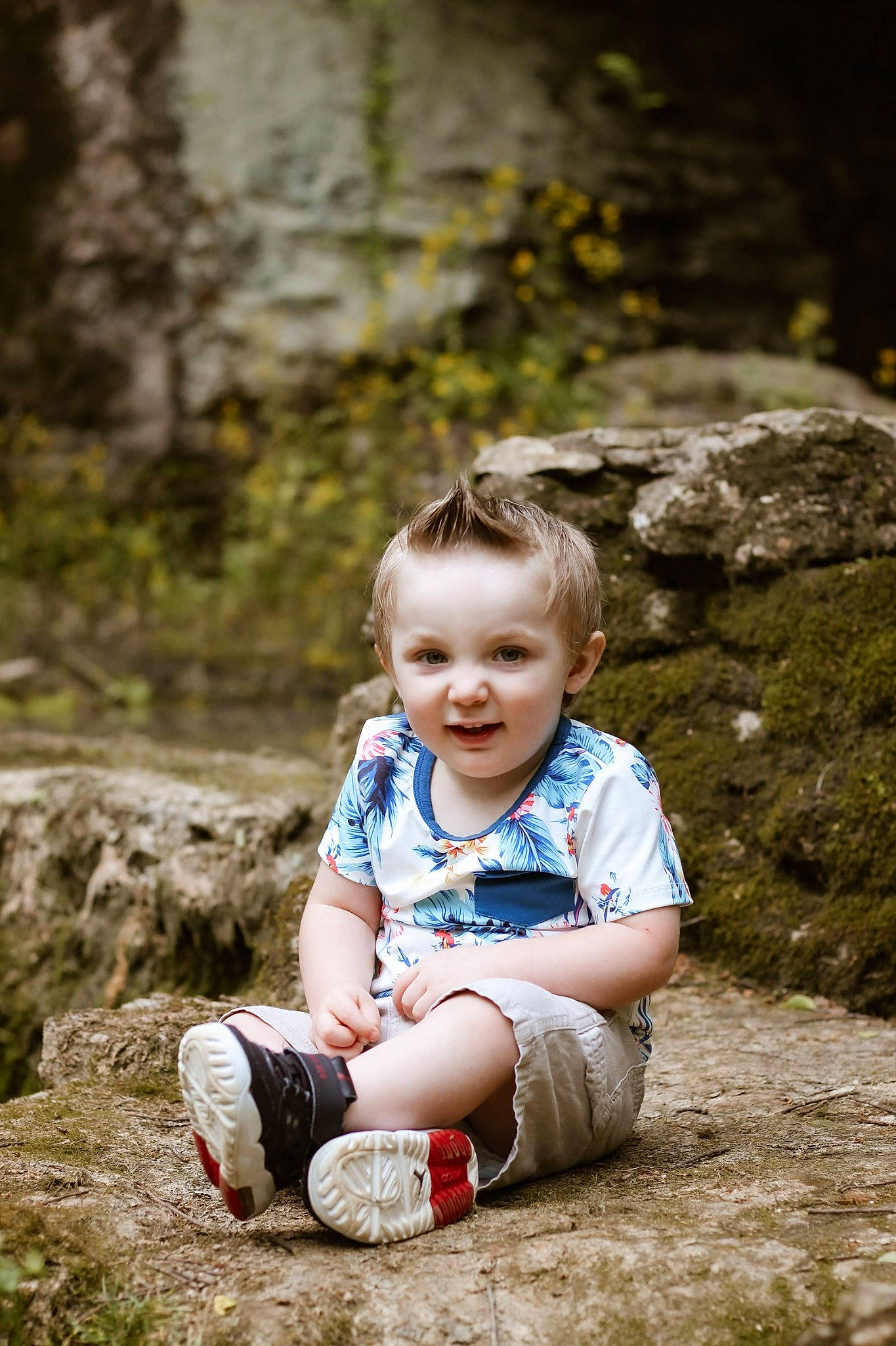 Aubrey V is registered to the contest to win money with this photo: baby, baby_toddler_clothing, child, flash_photography, forest, fun, grass, happy, joy, landscape, leisure, people_in_nature, person, plant, portrait_photography, rock, sitting, smile, soil, toddler