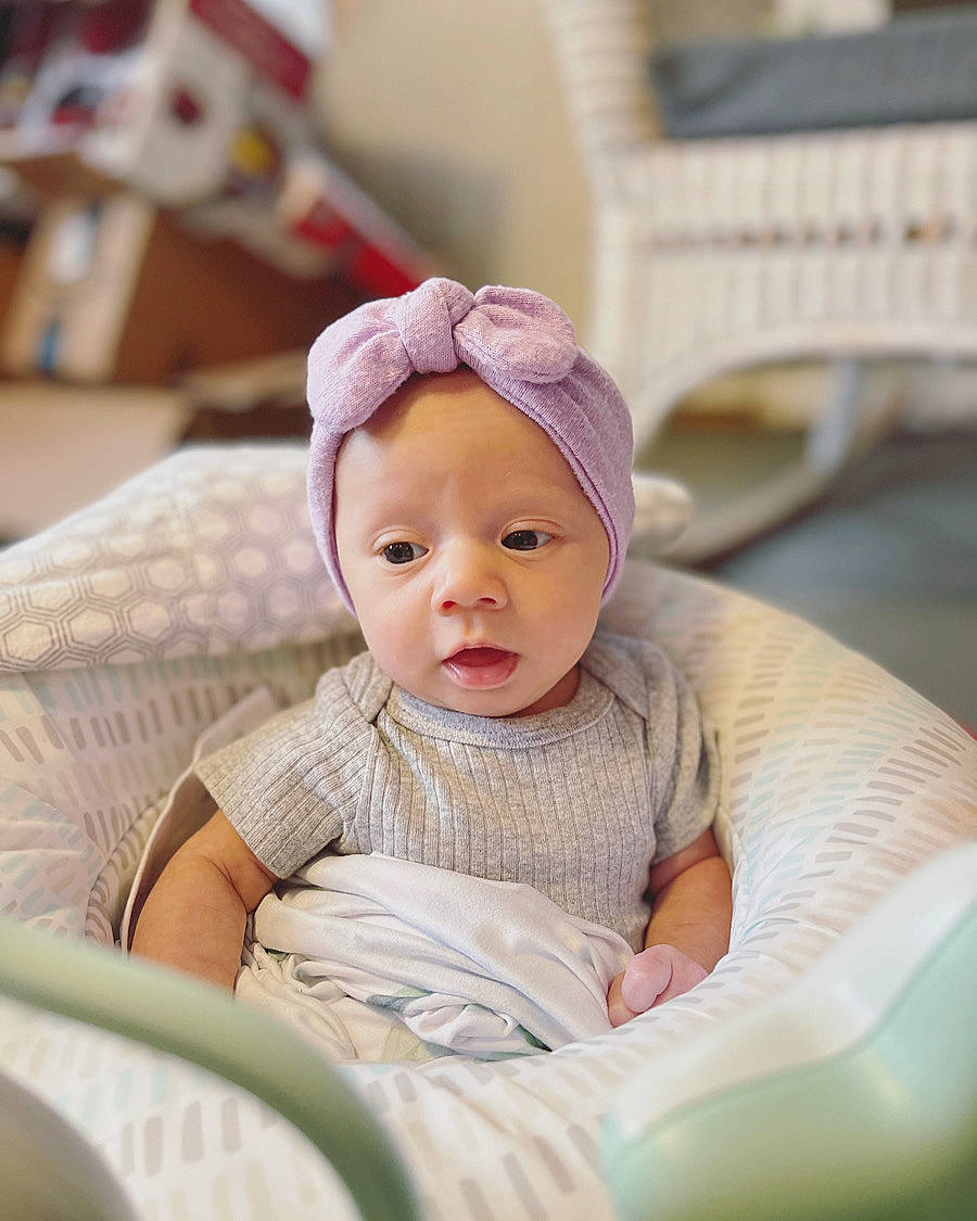 Torvi is registered to the contest to win money with this photo: baby, baby_products, baby_safety, baby_toddler_clothing, cap, cheek, child, comfort, fashion_accessory, fun, happy, hat, headwear, linens, person, portrait_photography, room, sitting, skin, sleeve