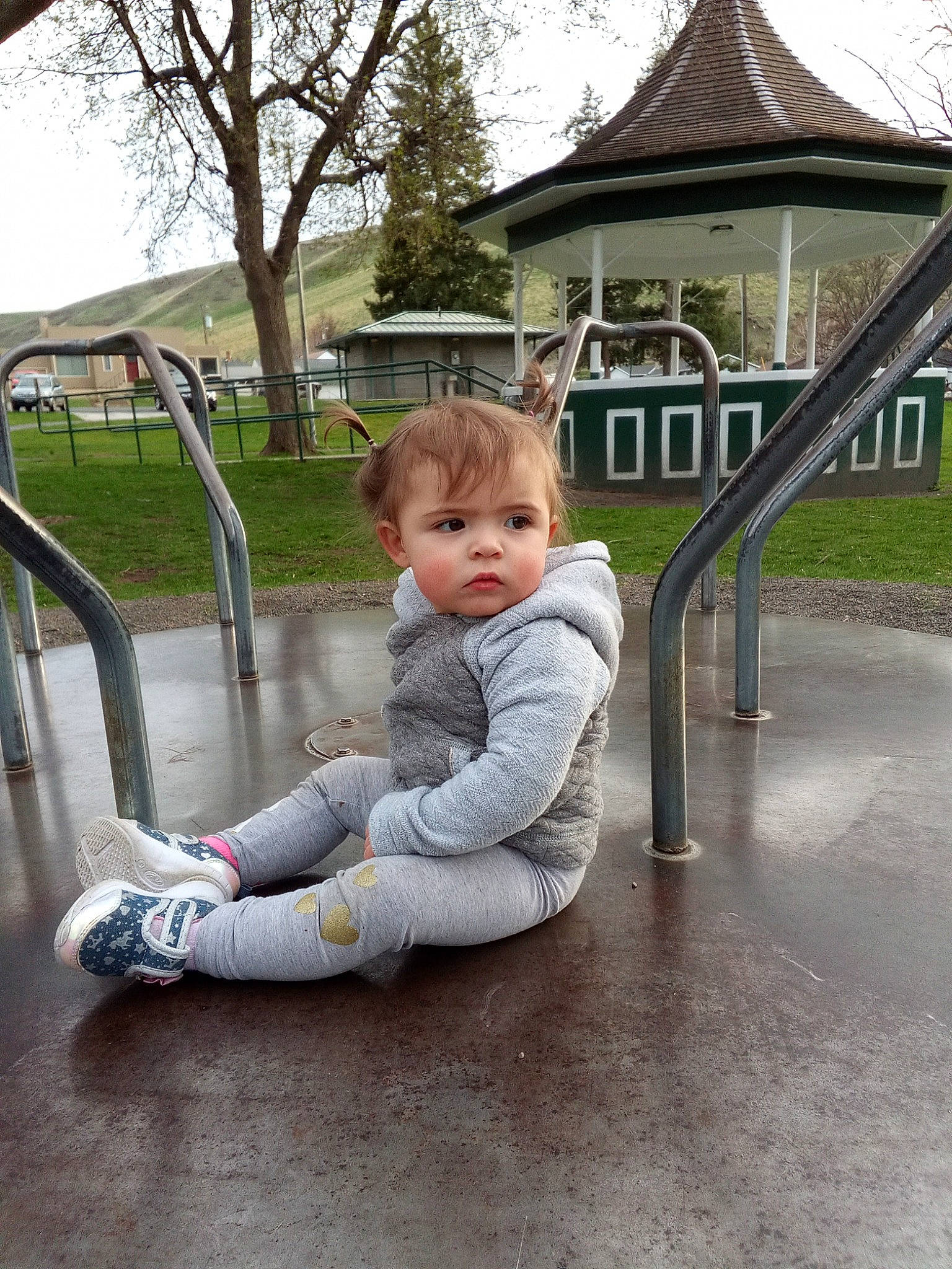 Amaya is registered to the contest to win money with this photo: baby, baby_products, baby_toddler_clothing, chute, city, flooring, fun, grass, house, leisure, outdoor_play_equipment, person, plant, playground, recreation, sitting, sky, swing, toddler, tree