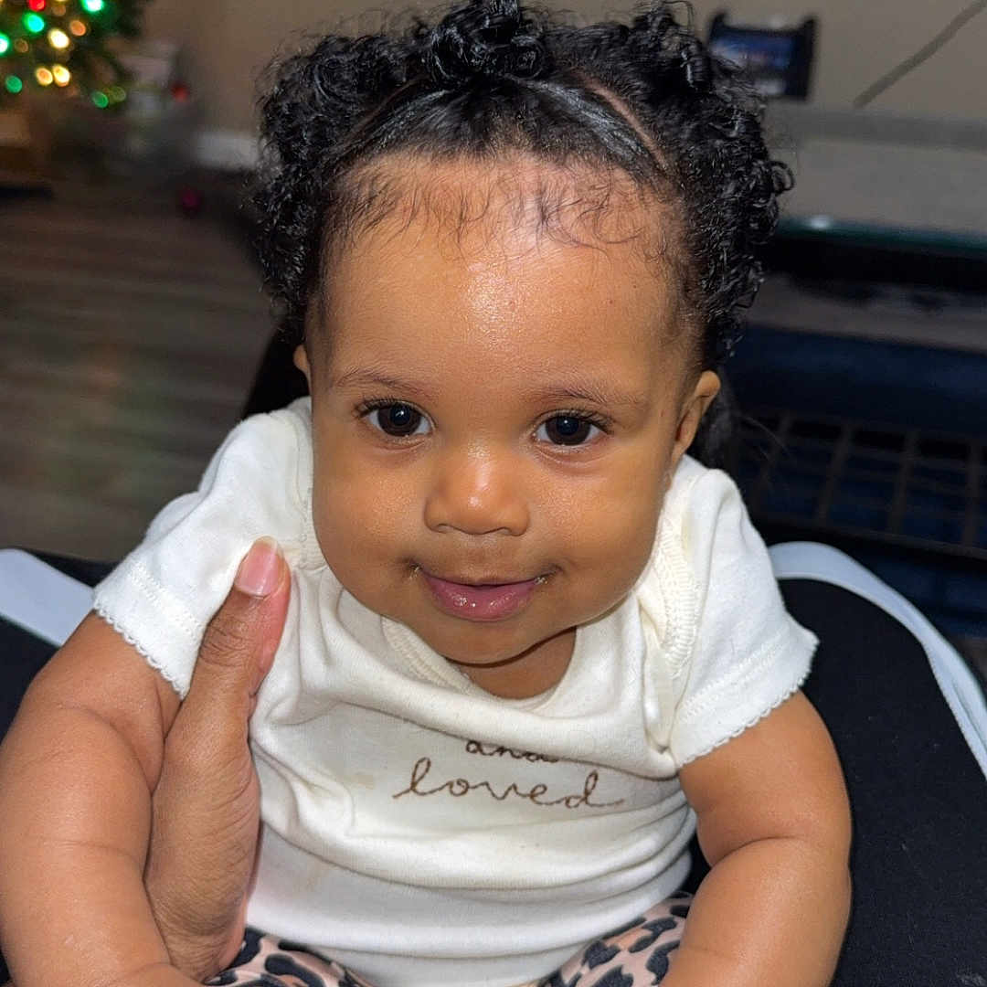 Klover joined the competition — help win amazing prizes! accessories, baby, blackhair, bodypart, couch, electronics, face, finger, furniture, hair, hand, happy, head, jewelry, person, photography, portrait, screen, sitting, smile