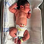 Kingsley is registered to the contest to win money with this photo: newborn, baby, infant, sleeping, hospital, diaper, wristband, ankleband, skin, human, person, lying_down, sleep, cute, healthcare, white, blanket, bed, rest, small