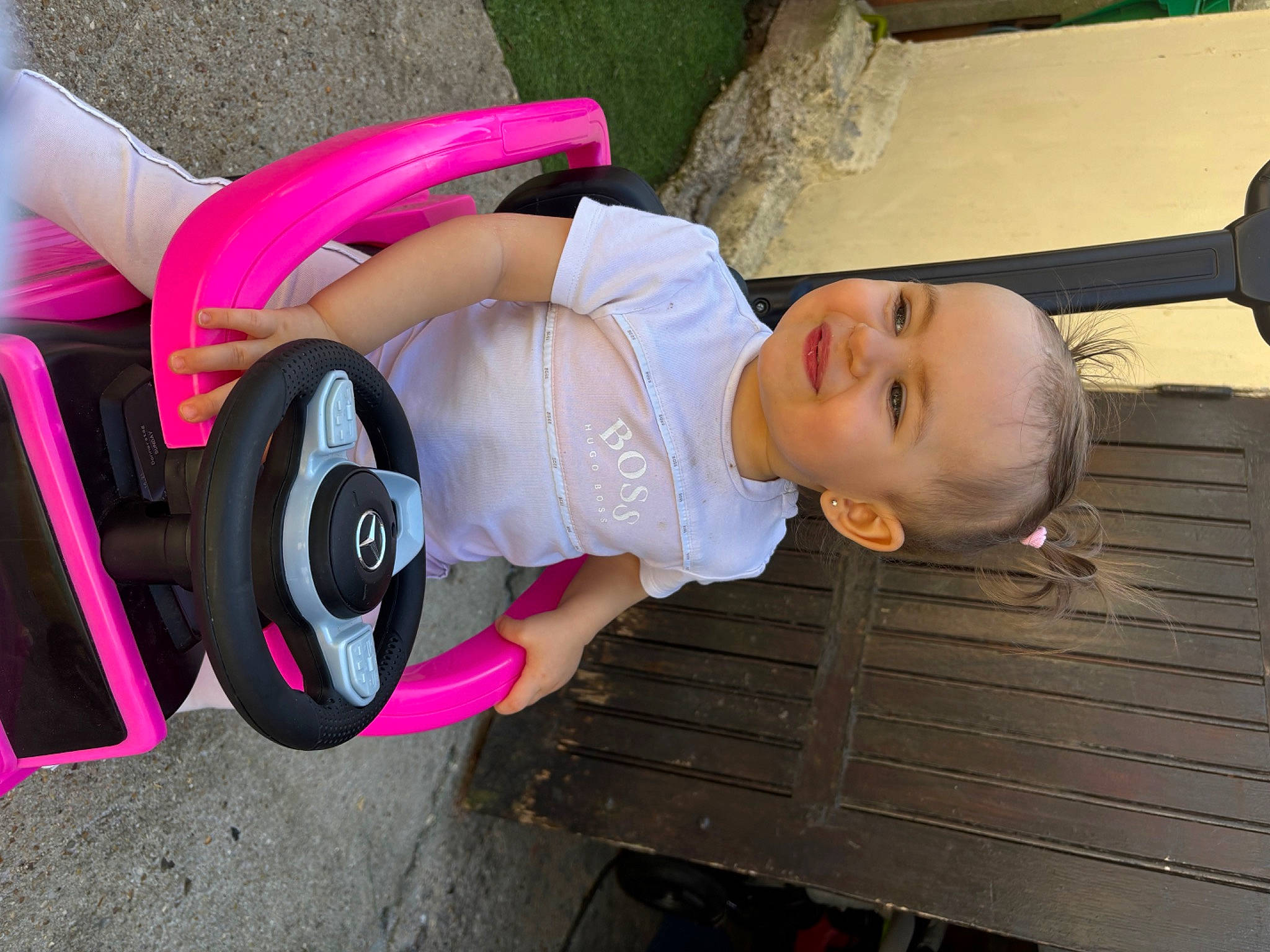 Shelsea participe au concours pour gagner de l'argent avec cette photo : auto_part, automotive_design, automotive_tire, automotive_wheel_system, baby, baby_carriage, baby_products, child, fun, happy, hat, joy, leisure, magenta, person, pink, smile, tire, toddler, tree