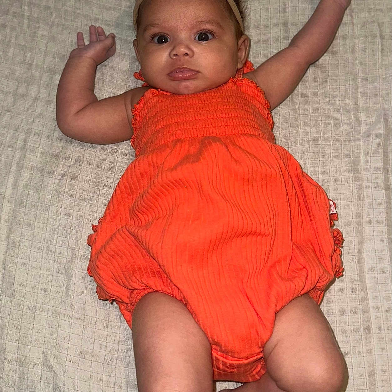 Azari is registered to the contest to win money with this photo: baby, bed, bodypart, clothing, couch, cushion, dress, face, finger, furniture, hand, hat, head, homedecor, indoors, newborn, person, photography, portrait, sitting