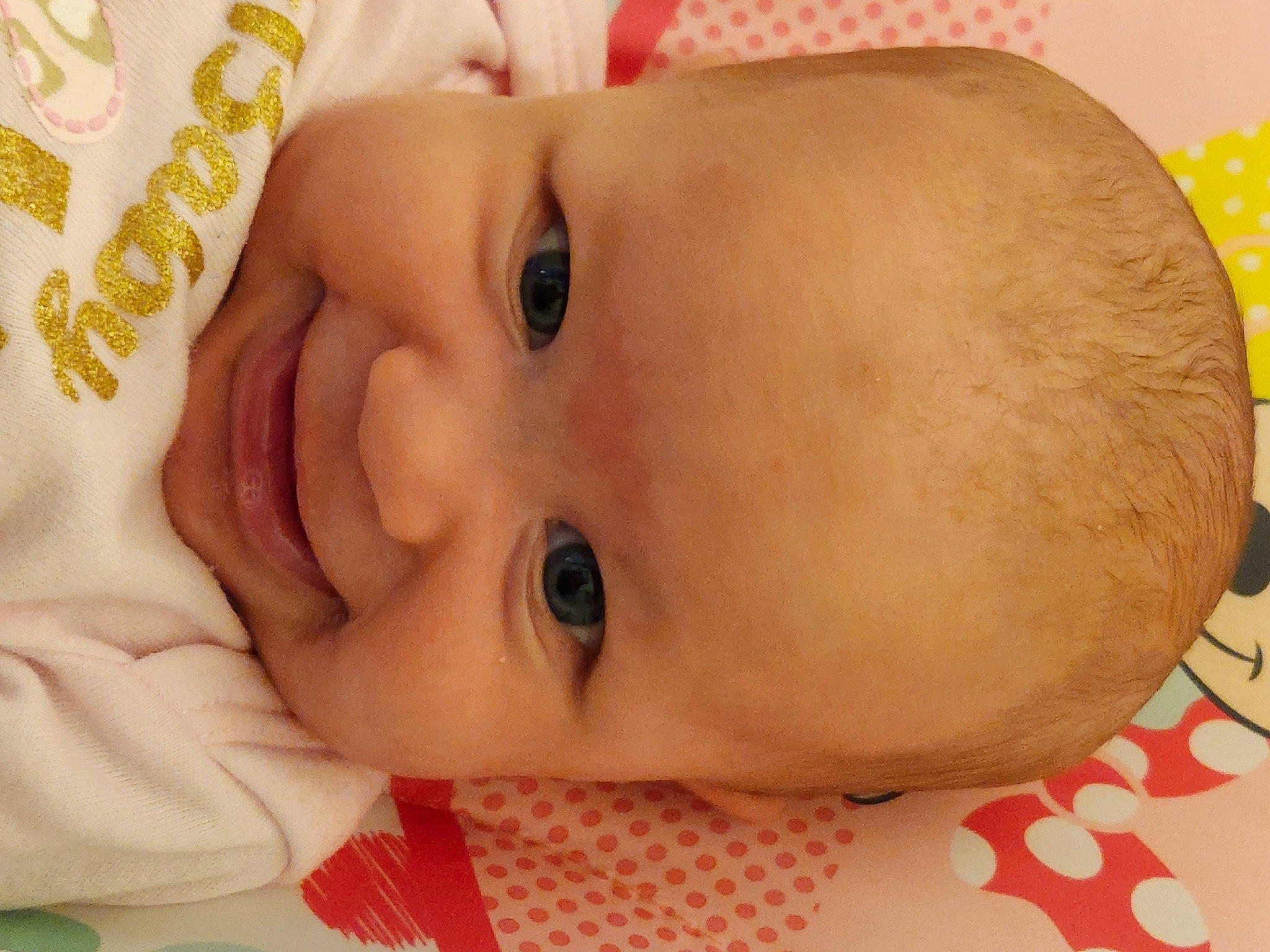 Melody is registered to the contest to win money with this photo: baby, baby_toddler_clothing, cheek, child, chin, close_up, eye, eyebrow, eyelash, face, finger, hand, happy, iris, lip, mouth, nose, person, skin, smile