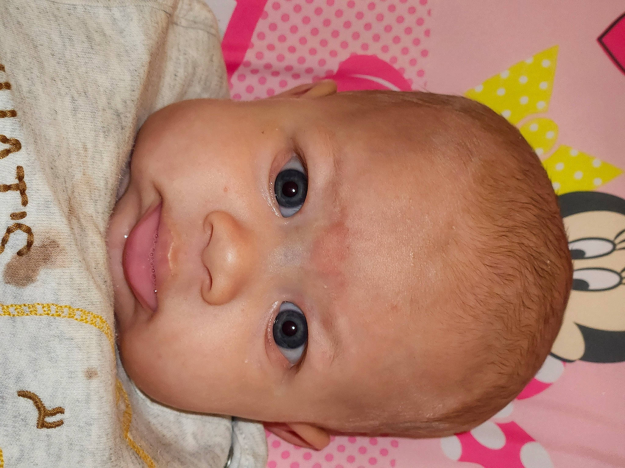 Melody is registered to the contest to win money with this photo: baby, baby_products, baby_toddler_clothing, cheek, child, chin, close_up, eye, eyebrow, eyelash, face, finger, iris, lip, mouth, nose, pattern, person, pink, skin