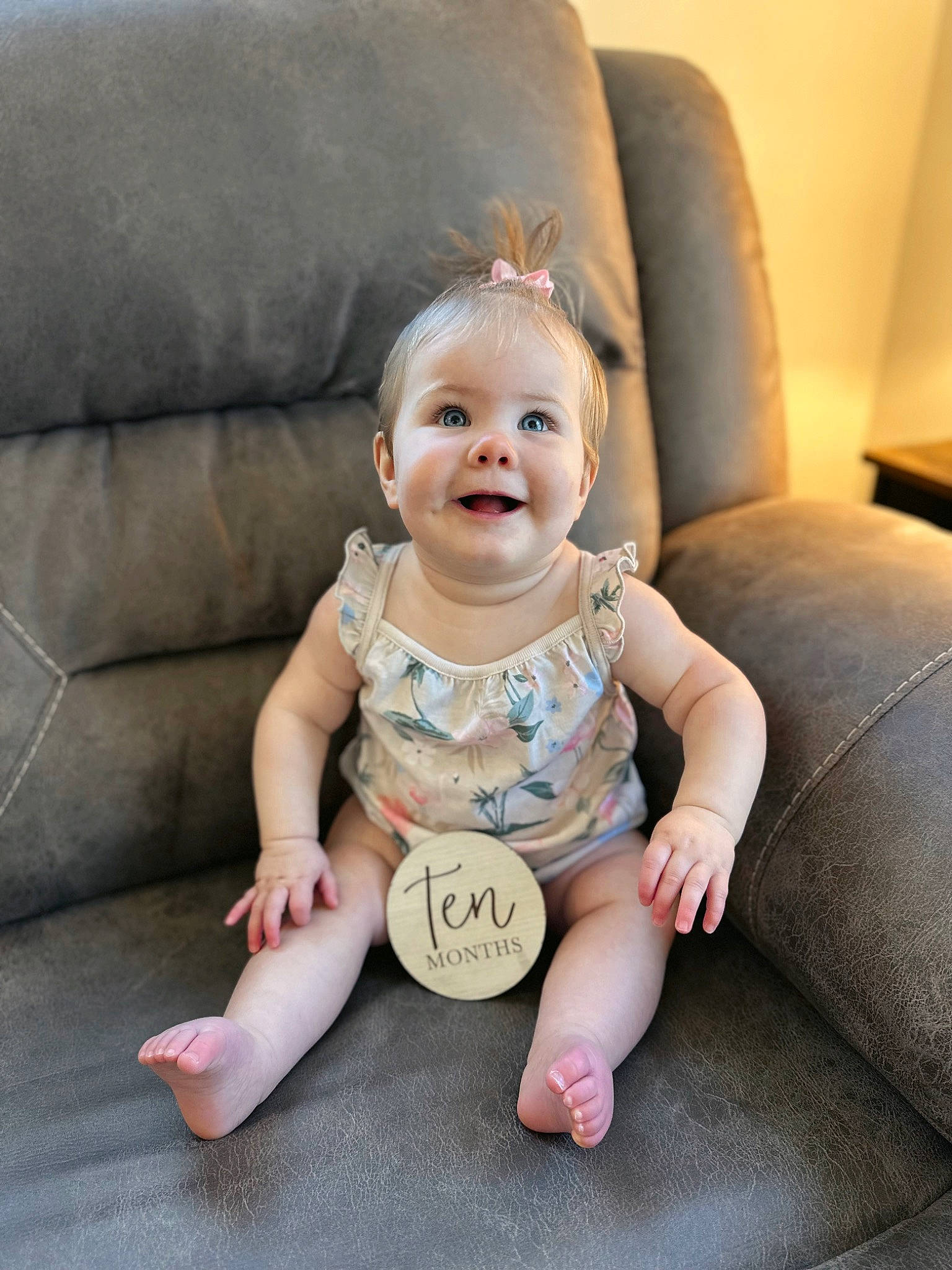 Blakely joined the competition — help win amazing prizes! baby, baby_toddler_clothing, cheek, child, comfort, couch, eye, flooring, foot, happy, head, human_leg, joy, living_room, person, sitting, skin, sleeve, smile, thigh