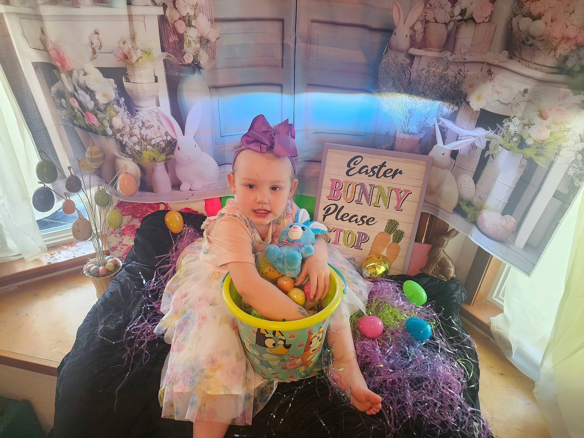 Peyton is registered to the contest to win money with this photo: baby, baby_toddler_clothing, beauty, child, event, fun, happy, hat, headwear, leisure, living_room, magenta, person, pink, purple, room, sitting, stuffed_toy, textile, toddler