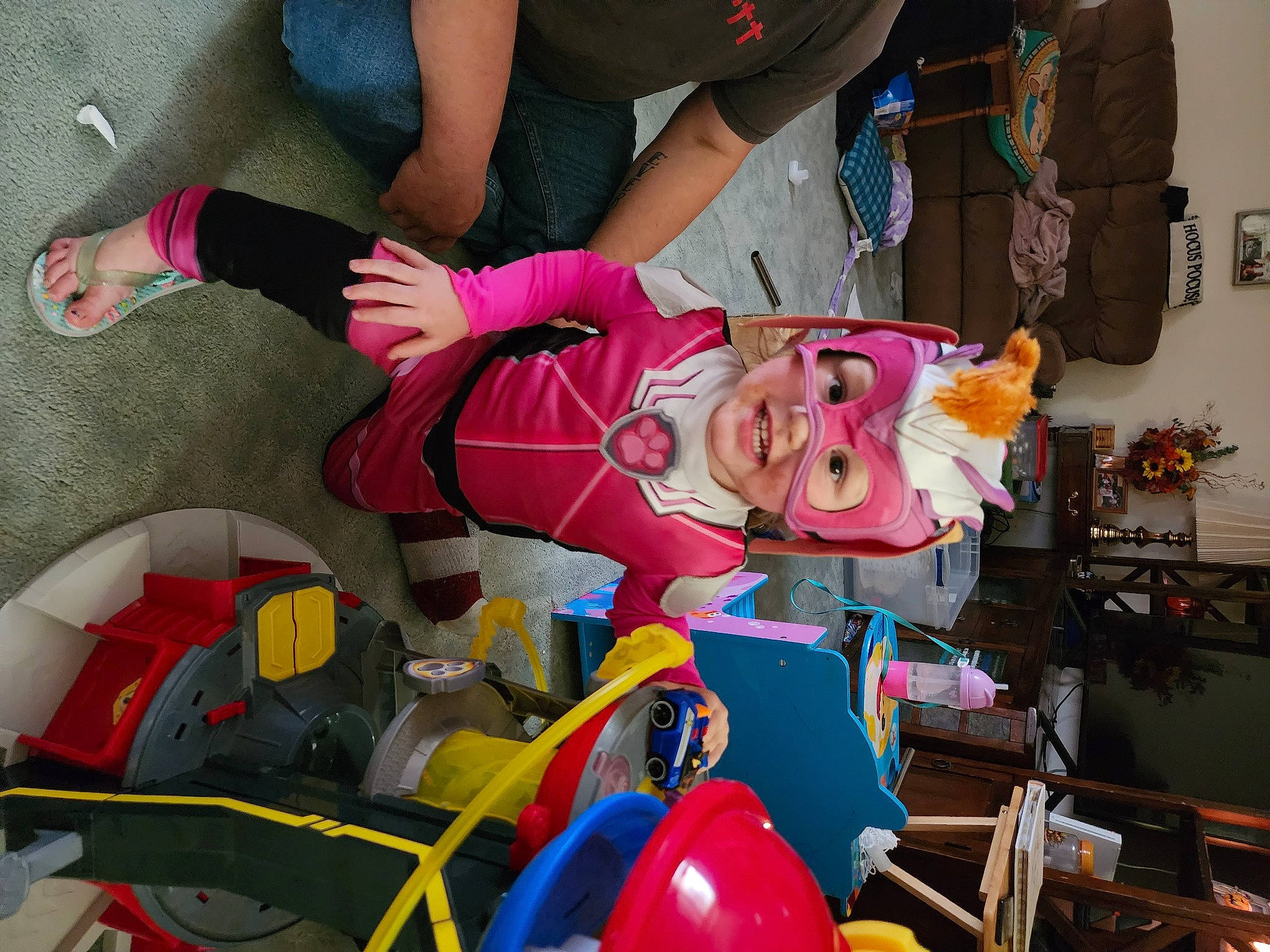 Peyton is registered to the contest to win money with this photo: animation, balloon, carmine, costume, event, fiction, fictional_character, fun, headwear, houseplant, leisure, person, pink, plastic, recreation, toy