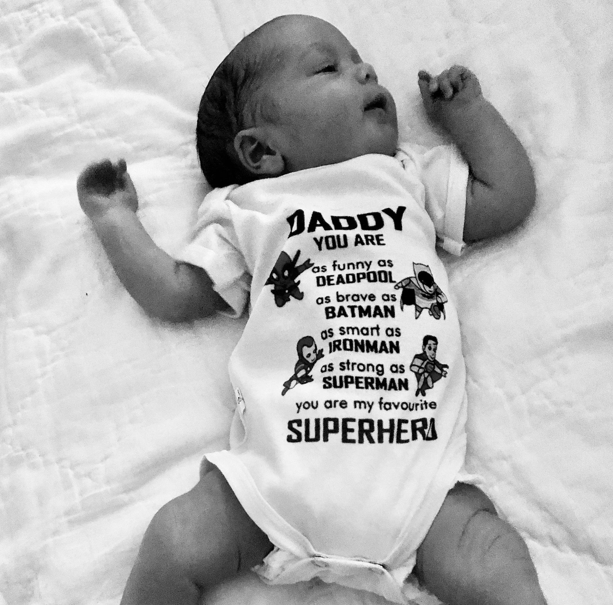 Dimitri is registered to the contest to win money with this photo: baby, baby_products, baby_toddler_clothing, black_and_white, child, happy, monochrome, person, photography, style, toddler, white