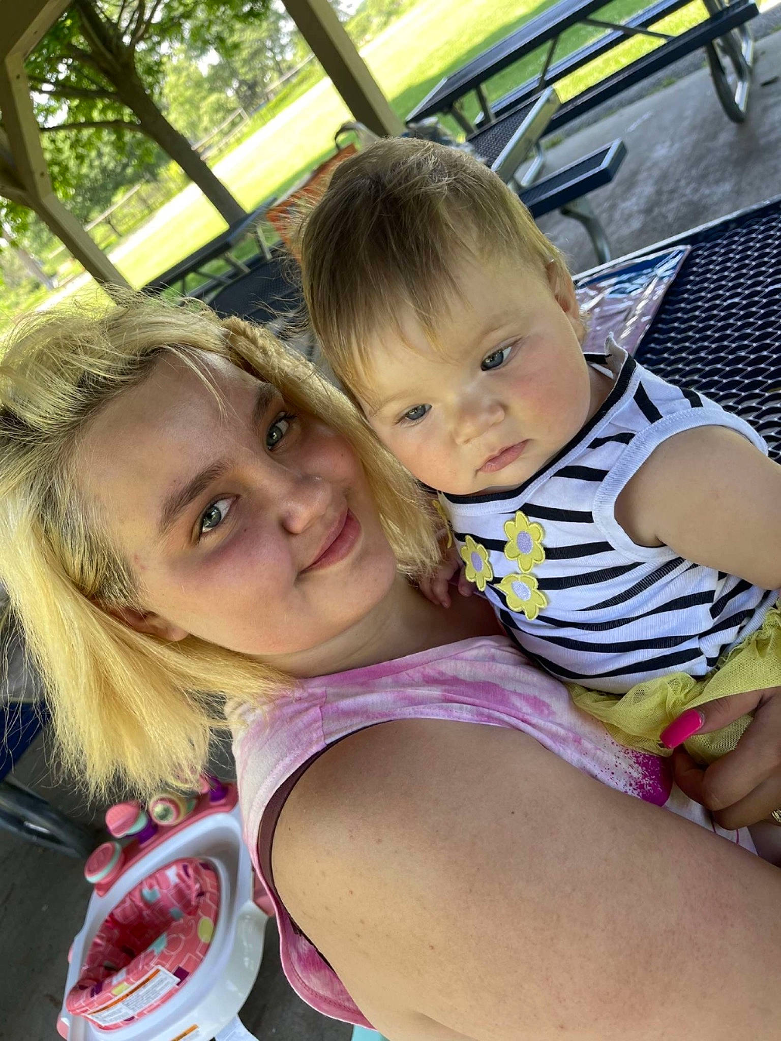 Leylah is registered to the contest to win money with this photo: chair, eye, facial_expression, fun, grass, happy, head, human_body, iris, joy, lap, leg, leisure, mouth, people_in_nature, person, recreation, skin, smile, thigh