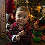 Erik joined the competition — help win amazing prizes! toddler, child, pajamas, plaid, christmas_tree, holiday_lights, carpet, toy, elf, decorations, festive, indoors, cute, expression, sitting, holiday, childrens_clothing, warm_lighting, face, person