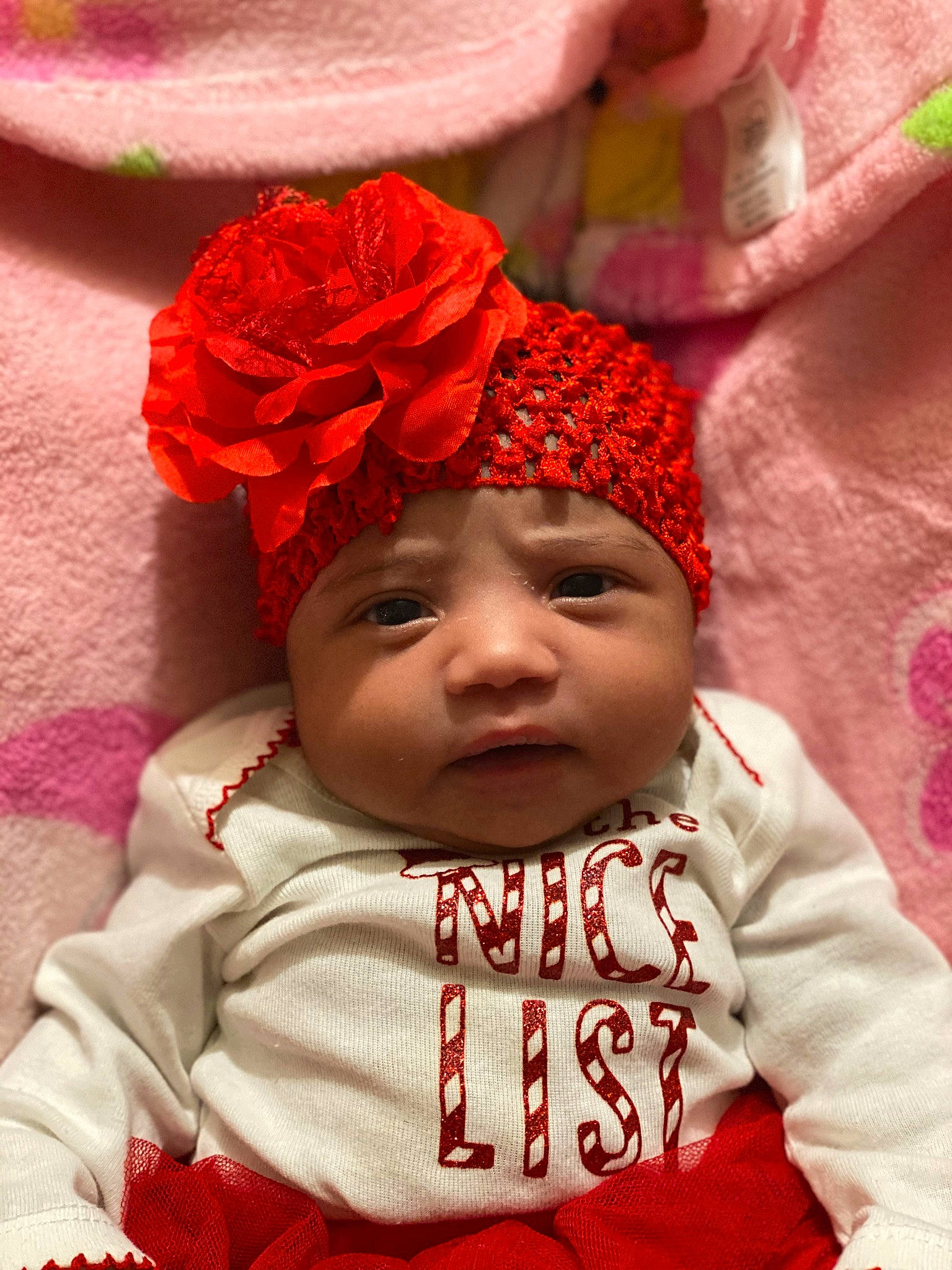 Alexandralys Burgos joined the competition — help win amazing prizes! baby, cheek, child, fashion_accessory, hair_accessory, headgear, headwear, knit_cap, knitting, person, pink, red, toddler, wool