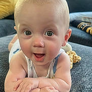 Leo joined the competition — help win amazing prizes! arms, baby, child, closeup, couch, cute, expression, eyes, face, furniture, giraffe, happy, home, indoor, infant, mouth, person, plush_toy, skin, smiling