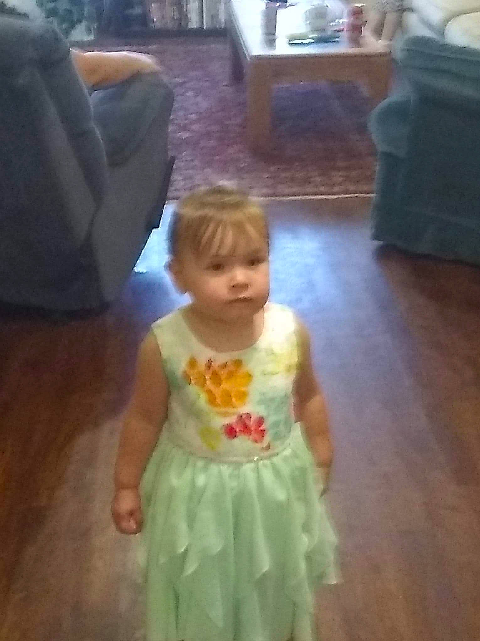 Jorja joined the competition — help win amazing prizes! baby, child, costume, dress, face, floor, flooring, head, iris, person, plant, play, sitting, skin, smile, standing, toddler, vacation, yellow