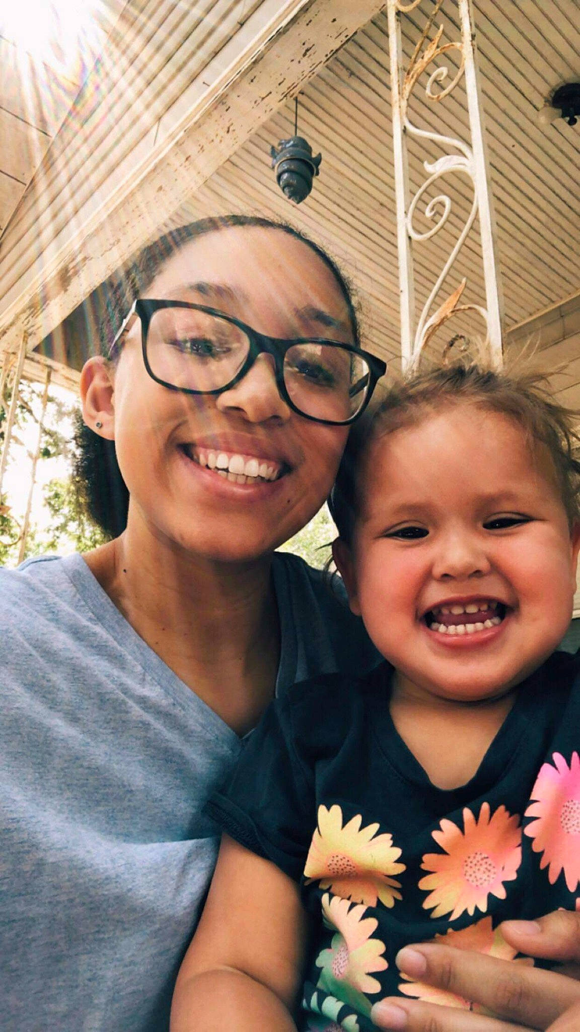 Jorja is registered to the contest to win money with this photo: child, daughter, face, facial_expression, family, father, fun, glasses, happy, head, headwear, joy, laugh, mother, people, person, photography, selfie, skin, smile