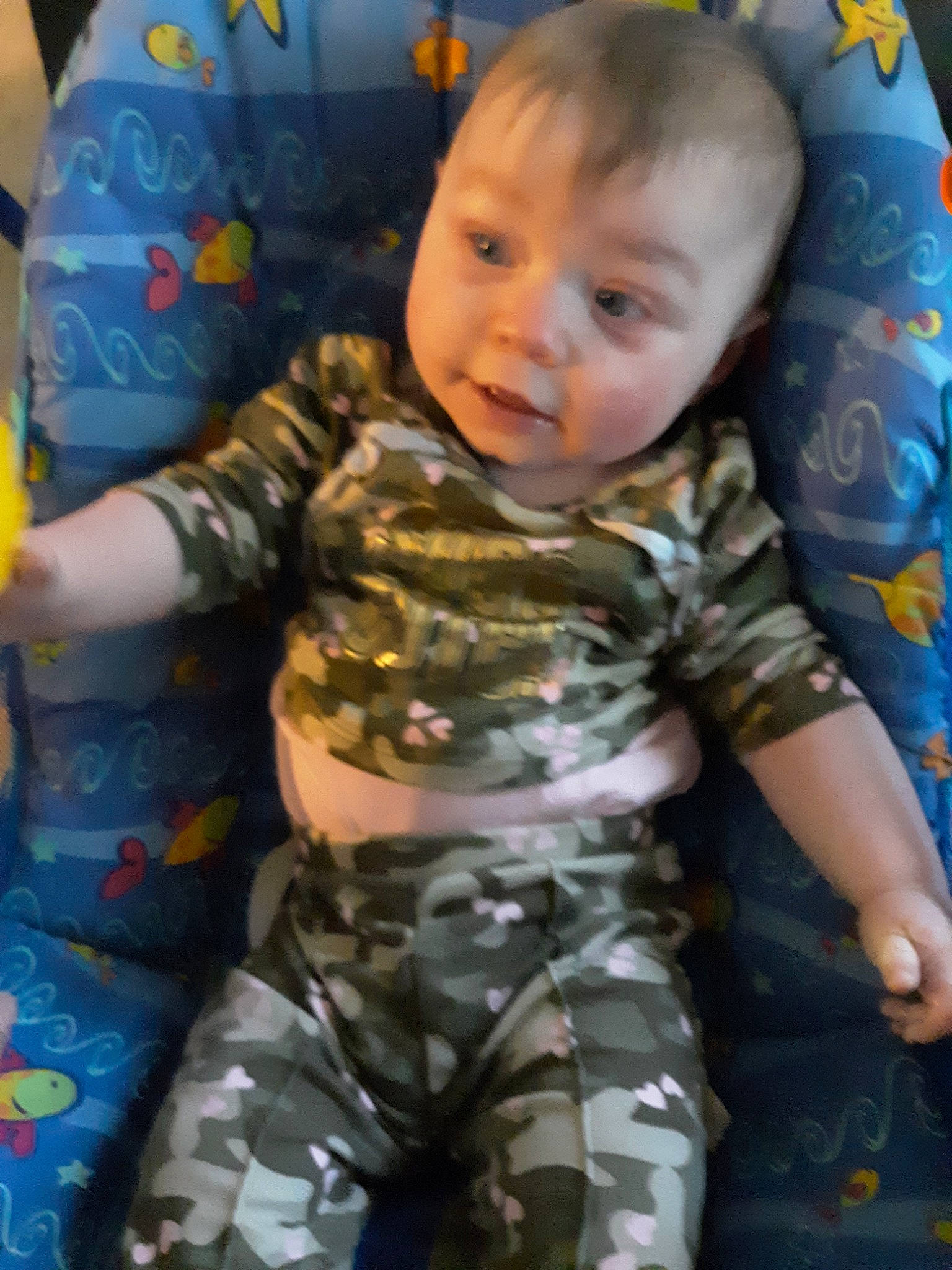 Jeslyn is registered to the contest to win money with this photo: baby, camouflage, child, design, military_camouflage, pattern, person, toddler