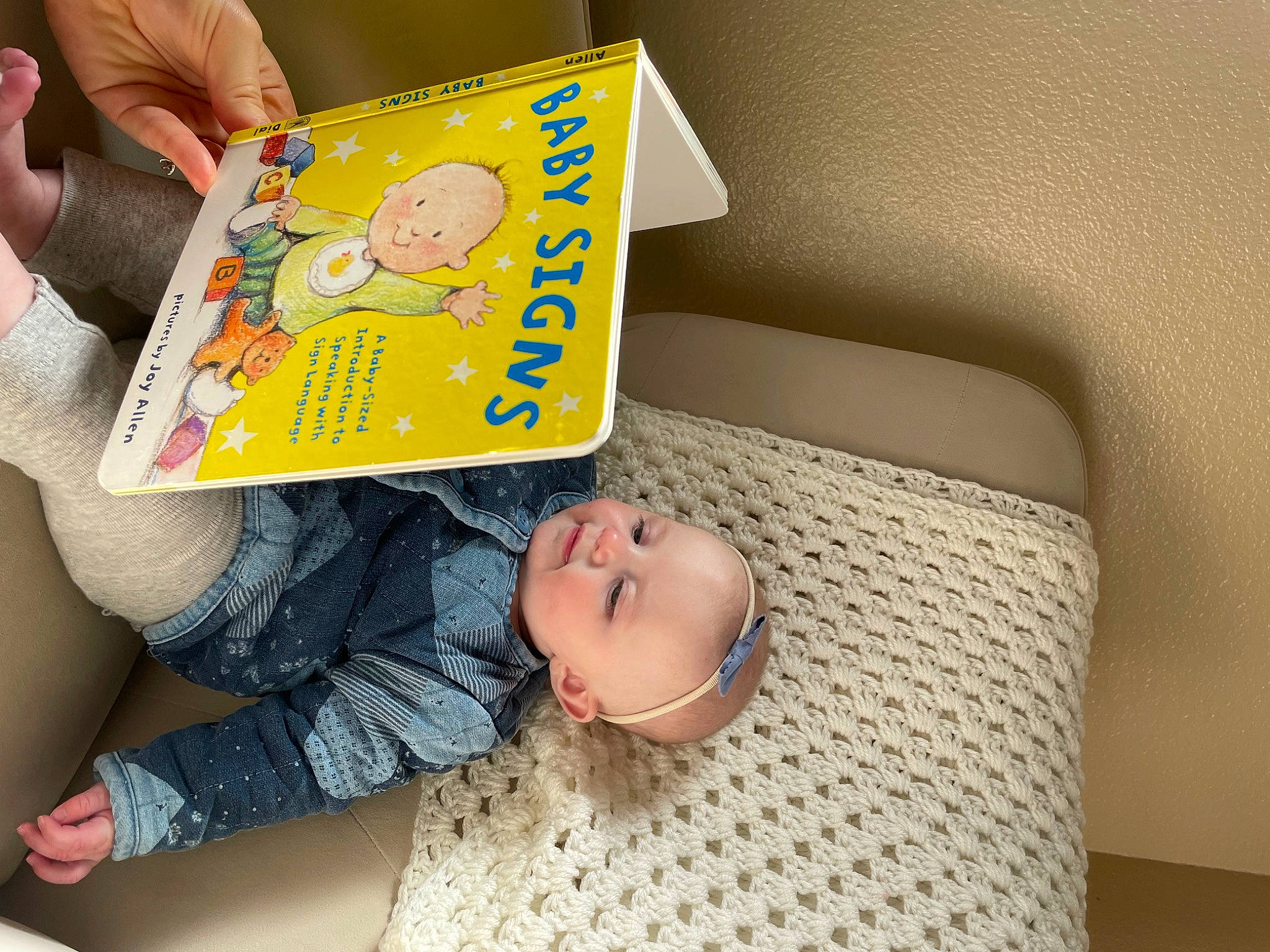 Adrienne joined the competition — help win amazing prizes! art, baby, baby_safety, baby_toddler_clothing, bed, bedding, child, comfort, finger, flooring, happy, infant_bed, linens, person, publication, room, shelf, sleeve, smile, textile